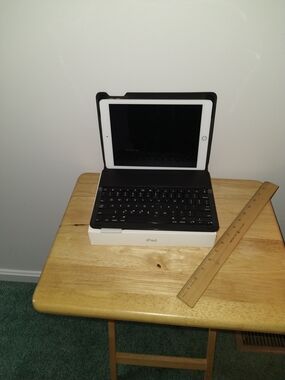 Apple iPad with Black Keyboard and White Front Bezel